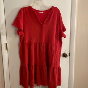 Short sleeve dark orange/rust dress. 100% cotton. V-neck. Three tiered design.